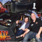 Michael J Fox in the official BTTF Car DeLorean Time Machine at London Film and Comic Con 2015