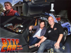 Michael J Fox in the official BTTF Car DeLorean Time Machine at London Film and Comic Con 2015
